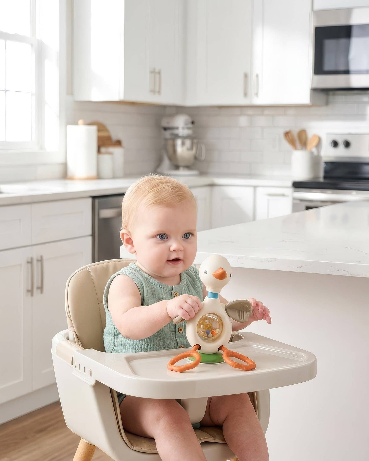 Itzy Ritzy | Itzy Twist & Bop™ - High Chair Sensory Toy Goose