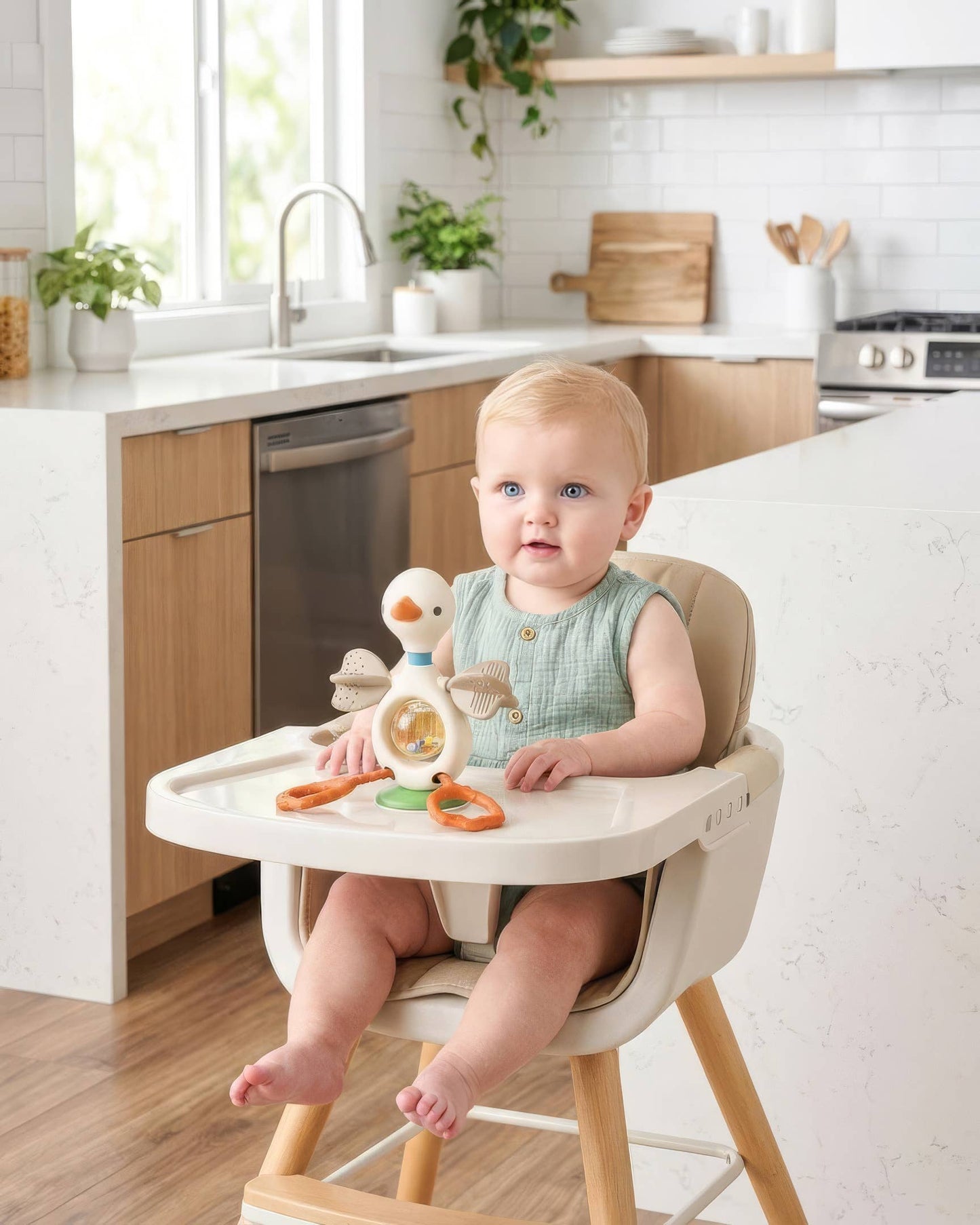 Itzy Ritzy | Itzy Twist & Bop™ - High Chair Sensory Toy Goose