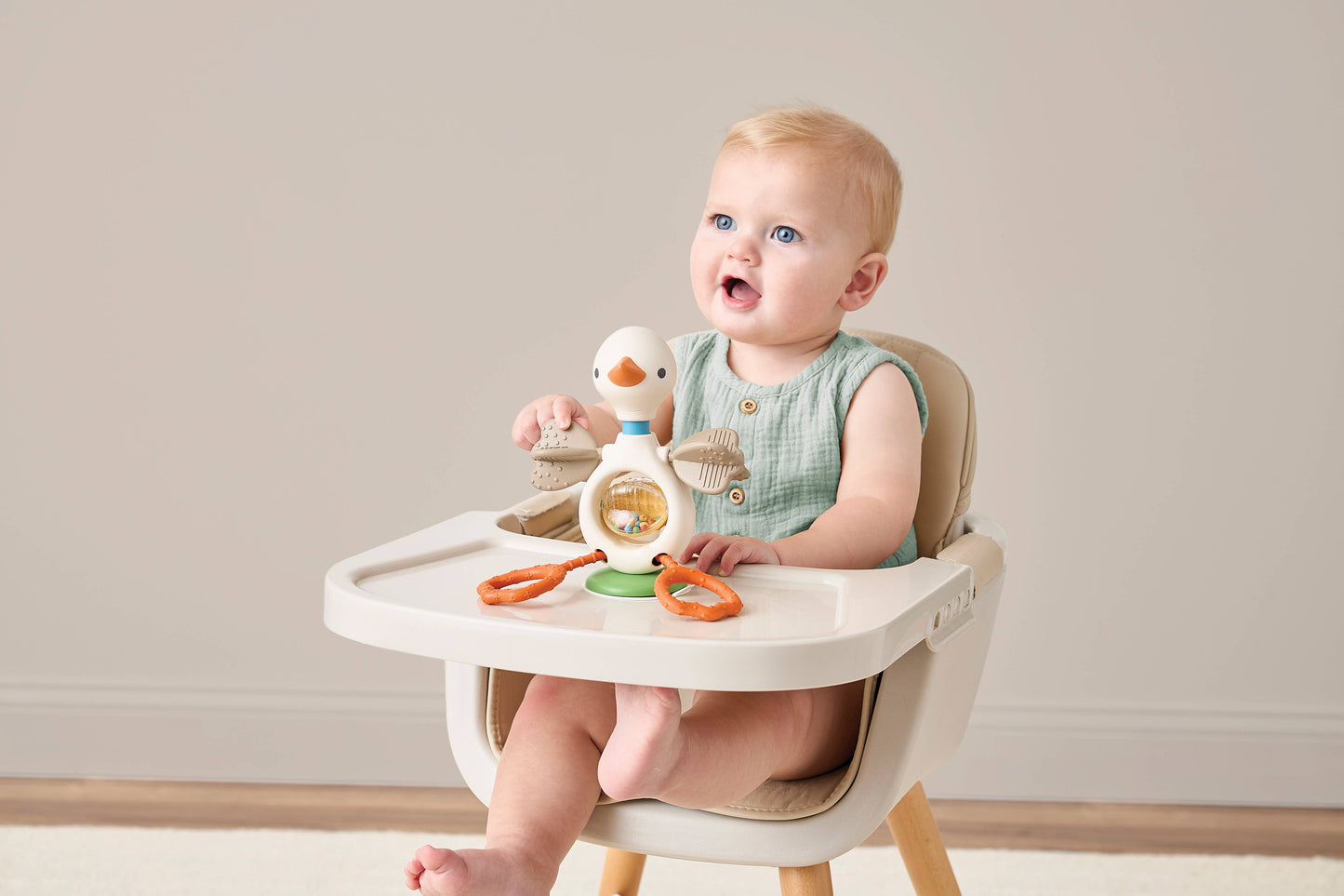 Itzy Ritzy | Itzy Twist & Bop™ - High Chair Sensory Toy Goose
