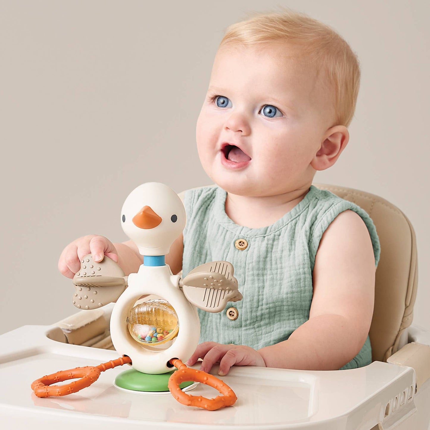 Itzy Ritzy | Itzy Twist & Bop™ - High Chair Sensory Toy Goose
